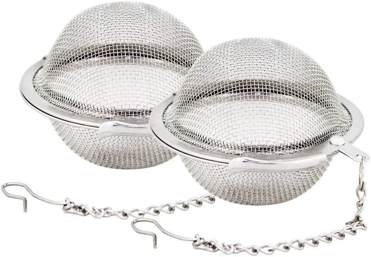 Tea strainers and filters arranged with loose-leaf tea for a calm, mindful brewing ritual